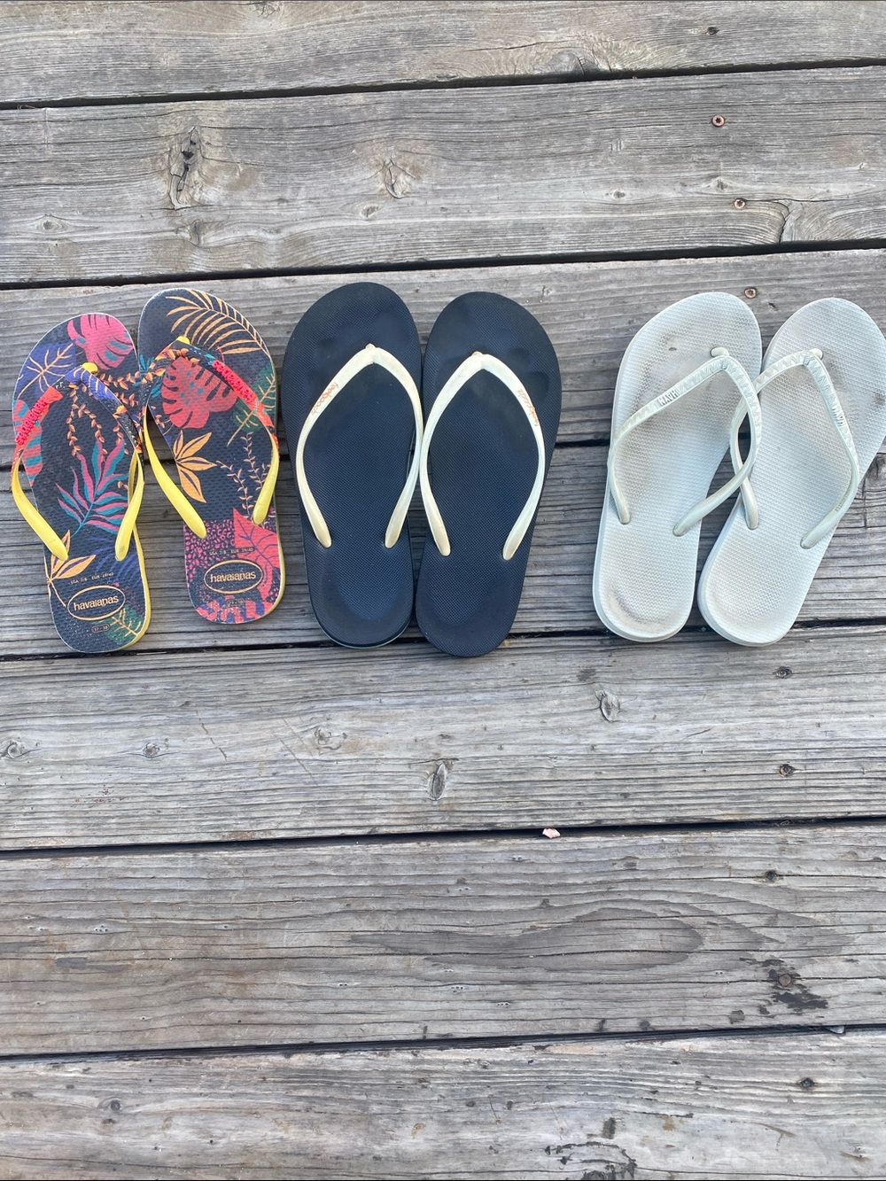 Three Pairs of Flip Flops - Tropical Print, Black, Light Gray